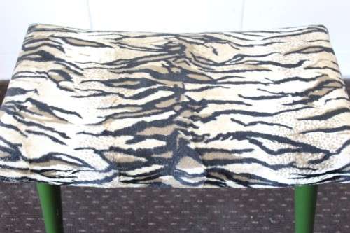 **RS17** A green painted yellow wood armchair with animal print & matching mid-century footrest