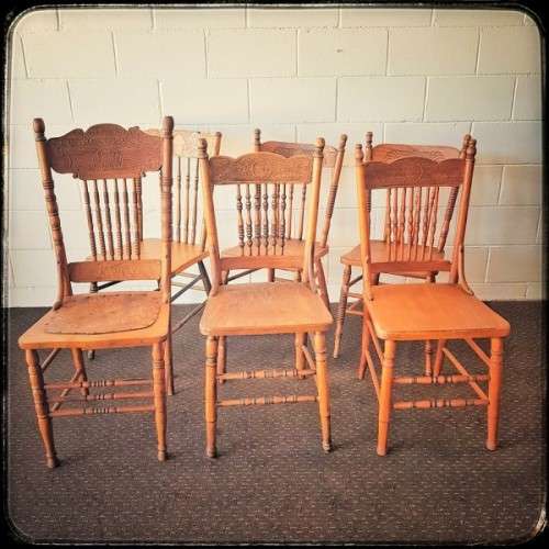 **RS17** An incredible collection of six assorted oak spindle-back dining chairs - one price for all