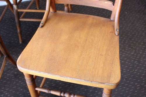 **RS17** An incredible collection of six assorted oak spindle-back dining chairs - one price for all