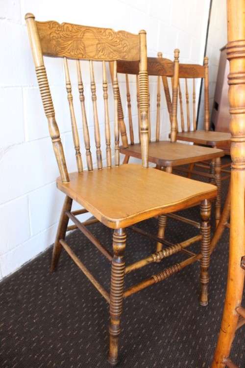 **RS17** An incredible collection of six assorted oak spindle-back dining chairs - one price for all