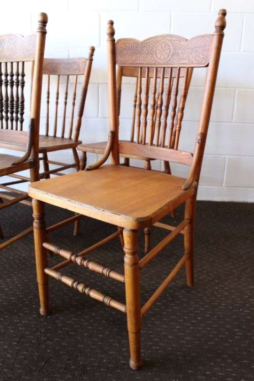 **RS17** An incredible collection of six assorted oak spindle-back dining chairs - one price for all