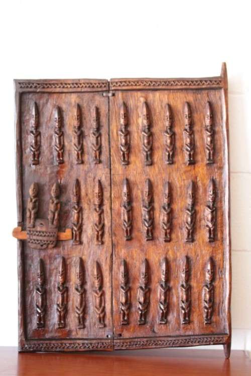 **RS17** A hand carved vintage/ antique? West African (Mali) "Dogon" granary door with sliding latch