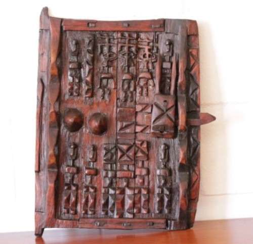 **RS17** A hand carved vintage/ antique? West African (Mali) Dogon granary door w/ sliding latch