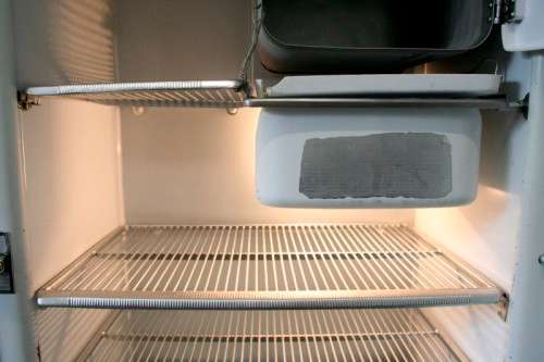 A fantastic vintage General Electric fridge-freezer combo "1940's" in full working order.