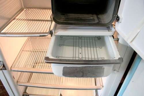 A fantastic vintage General Electric fridge-freezer combo "1940's" in full working order.