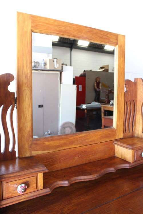 An amazing vintage Oak 3-drawer dressing table with tri-folding mirrors and porcelain drawer handles