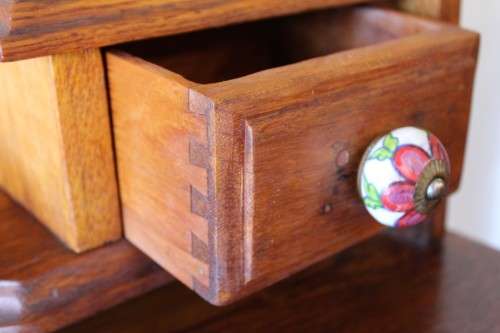 An amazing vintage Oak 3-drawer dressing table with tri-folding mirrors and porcelain drawer handles