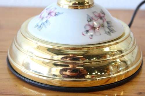 A lovely parlour table lamp with a glass panelled shade and brass-finished base - stunning on a desk