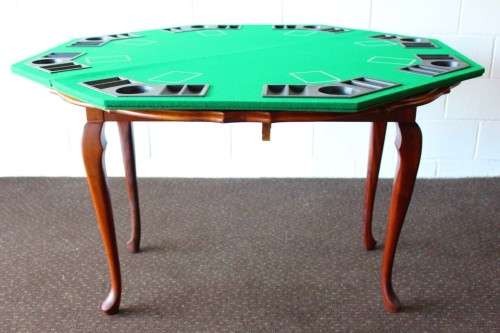 **RS17** A felt-lined folding poker table with built in chip racks and drink holders, in a carry bag