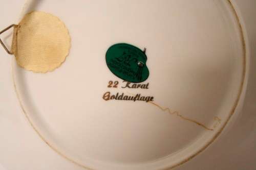 **RS17** A wonderful 22 karat German made Goldauflage love story portrait wall plate with a hook.