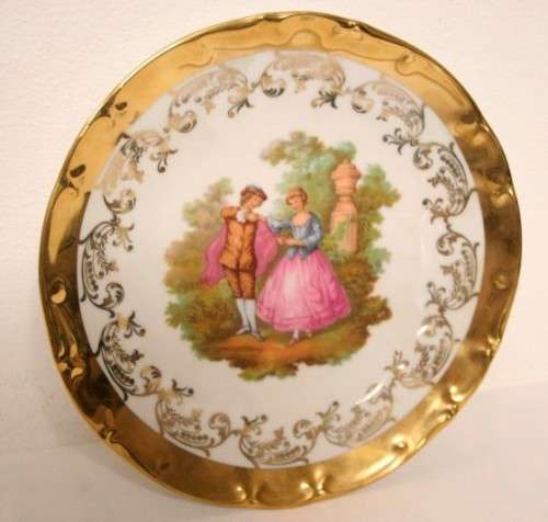 **RS17** A wonderful 22 karat German made Goldauflage love story portrait wall plate with a hook.