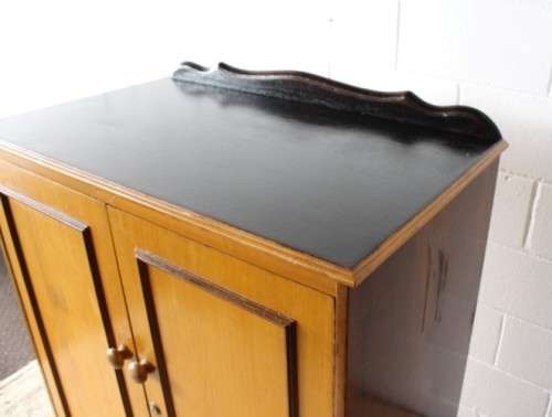 A wonderful Imbuia and Yellow wood double-door cabinet with shelves & space for a bar fridge