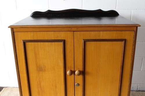 A wonderful Imbuia and Yellow wood double-door cabinet with shelves & space for a bar fridge