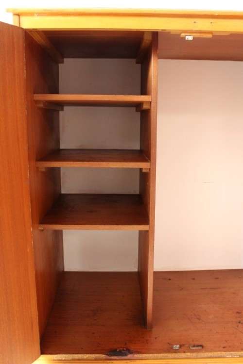 A wonderful Imbuia and Yellow wood double-door cabinet with shelves & space for a bar fridge