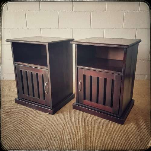 A modern pair of stylish dark wooden bedside pedestals with single doors and uncomplicated design!!
