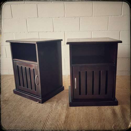 A modern pair of stylish dark wooden bedside pedestals with single doors and uncomplicated design!!