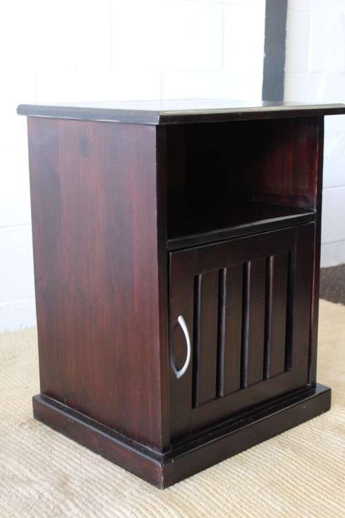 A modern pair of stylish dark wooden bedside pedestals with single doors and uncomplicated design!!