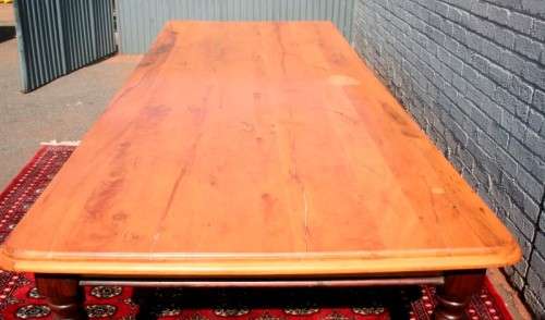 A spectacular x-long 10 seater Yellow wood & Imbuia dining room/ boardroom table in good condition