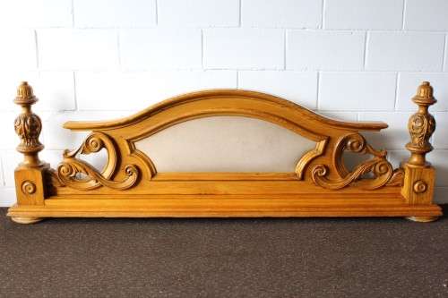 A stunning ornately carved solid Oak headboard and footboard set with upholstered centre panels!