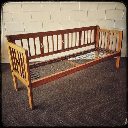 A very charming and sturdy 3-seater solid Oak daybed with carvings - perfect for sun room!