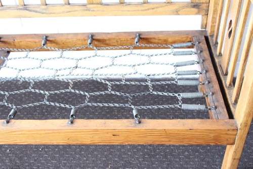A very charming and sturdy 3-seater solid Oak daybed with carvings - perfect for sun room!