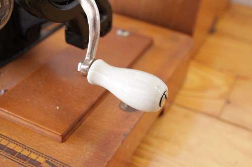 A rare antique German made Haid & Neu hand-cranked sewing machine in its original bentwood box