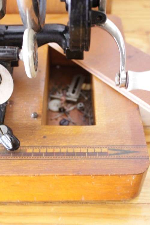 A rare antique German made Haid & Neu hand-cranked sewing machine in its original bentwood box