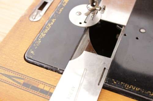 A rare antique German made Haid & Neu hand-cranked sewing machine in its original bentwood box