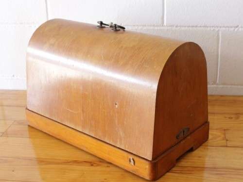 A rare antique German made Haid & Neu hand-cranked sewing machine in its original bentwood box