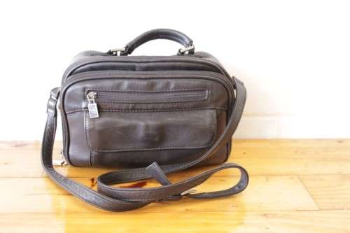 **RS17** An original black leather "Hush Puppies" travel document shoulder bag with loads of pockets