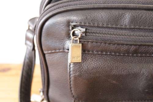 **RS17** An original black leather "Hush Puppies" travel document shoulder bag with loads of pockets