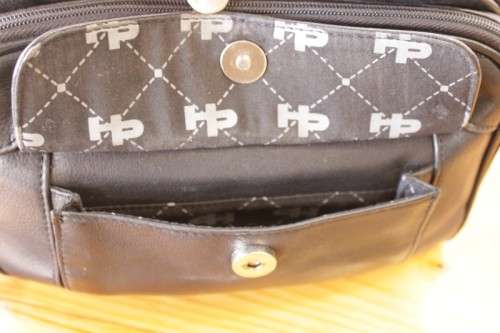 **RS17** An original black leather "Hush Puppies" travel document shoulder bag with loads of pockets