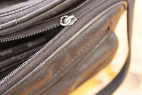 **RS17** An original black leather "Hush Puppies" travel document shoulder bag with loads of pockets