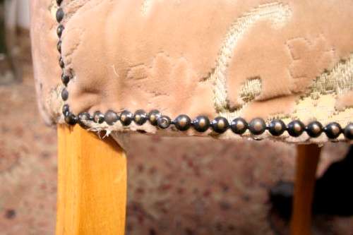 **RS17** A gorgeous Victorian "parlour chair" with carved detailing and floral upholstery.
