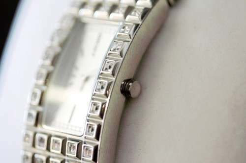 A stunning "DKNY" (ny3651) ladies wrist watch w/ a stainless steel & clear crystal bracelet