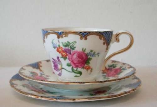 A beautiful vintage "Aynsley" fine bone china "Wilton Blue" pattern trio, gorgeous on display.