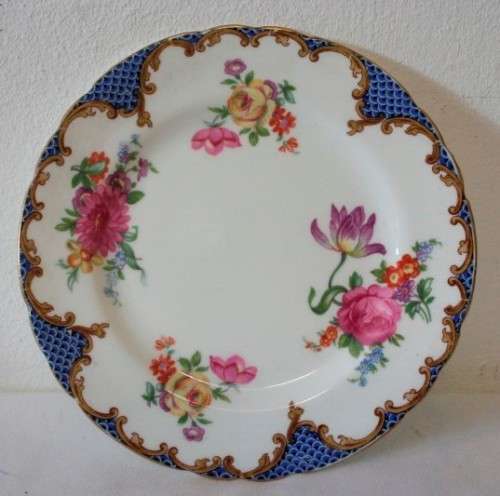 A beautiful vintage "Aynsley" fine bone china "Wilton Blue" pattern trio, gorgeous on display.