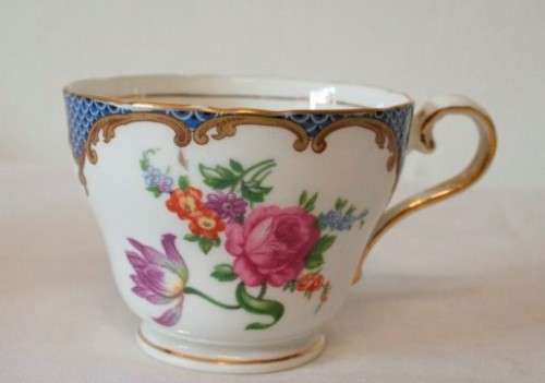 A beautiful vintage "Aynsley" fine bone china "Wilton Blue" pattern trio, gorgeous on display.