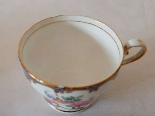 A beautiful vintage "Aynsley" fine bone china "Wilton Blue" pattern trio, gorgeous on display.
