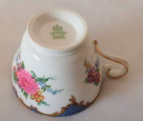 A beautiful vintage "Aynsley" fine bone china "Wilton Blue" pattern trio, gorgeous on display.