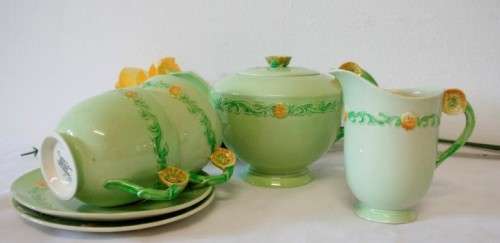A lovely (1930s) Carlton Ware "Australian design" Yellow buttercup garland design tea set for two