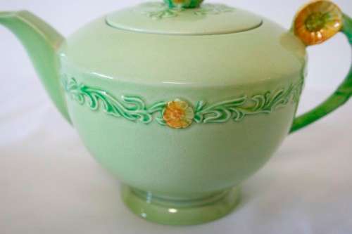 A lovely (1930s) Carlton Ware "Australian design" Yellow buttercup garland design tea set for two