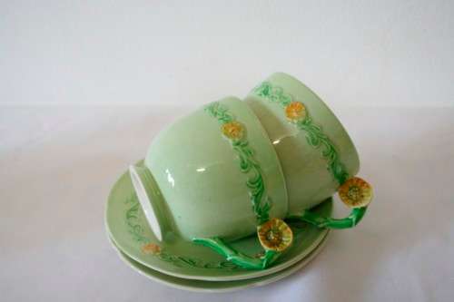 A lovely (1930s) Carlton Ware "Australian design" Yellow buttercup garland design tea set for two