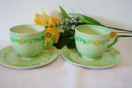 A lovely (1930s) Carlton Ware "Australian design" Yellow buttercup garland design tea set for two