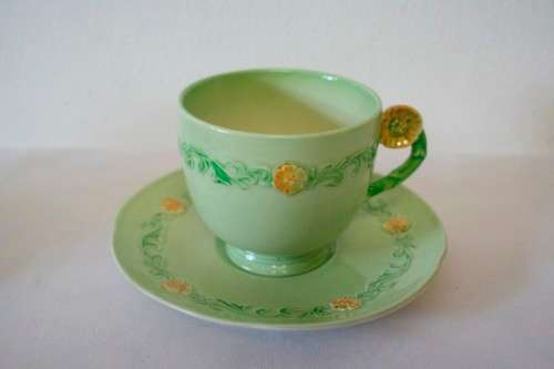 A lovely (1930s) Carlton Ware "Australian design" Yellow buttercup garland design tea set for two