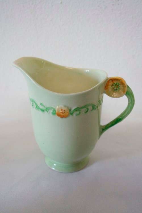 A lovely (1930s) Carlton Ware "Australian design" Yellow buttercup garland design tea set for two