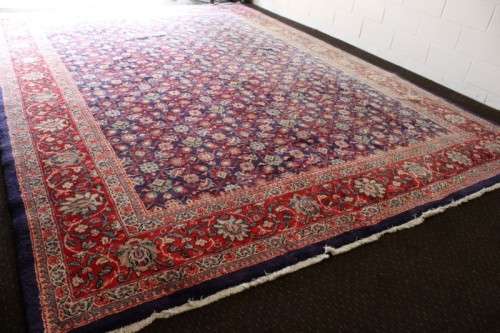 A superb large (4m x 3m) Iranian Tabriz "Afshan" Persian carpet in rich reds, blues and earthy tones