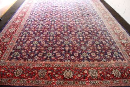 A superb large (4m x 3m) Iranian Tabriz "Afshan" Persian carpet in rich reds, blues and earthy tones