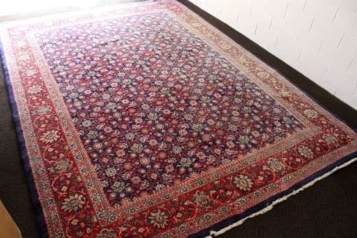 A superb large (4m x 3m) Iranian Tabriz "Afshan" Persian carpet in rich reds, blues and earthy tones