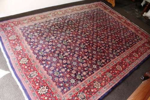 A superb large (4m x 3m) Iranian Tabriz "Afshan" Persian carpet in rich reds, blues and earthy tones